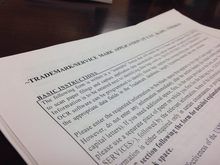 A document on a table with text on it.
