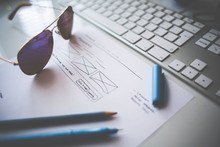 Are Agreements NOT to File Bankruptcy Enforceable? A desk with pens and a keyboard.