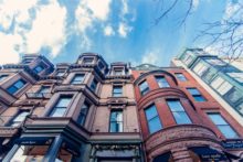 A row of buildings on a street in Boston, Massachusetts with the right to foreclose.