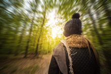 Pro Se Pitfalls: 5 Issues a Pro Se Bankruptcy Filer MUST Understand Before Filing a Bankruptcy Case A woman is walking through a forest before sunset.