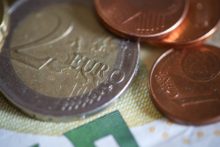 Close up coins on paper.